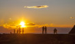 People watching the sunset